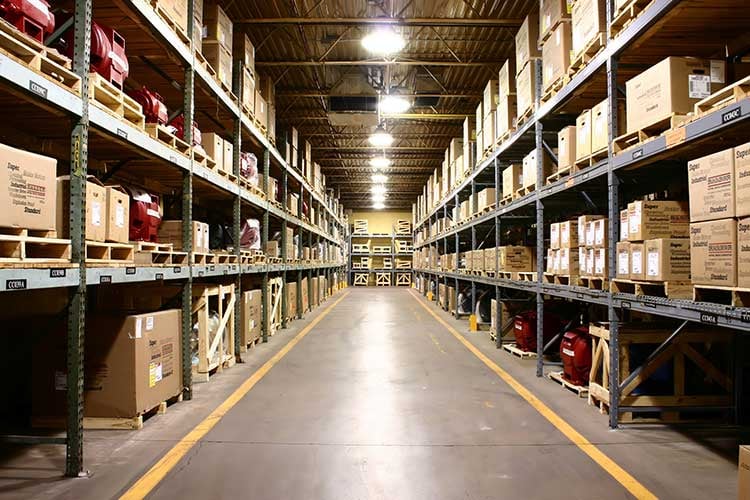 The inside of a warehouse with boxes of merchandise