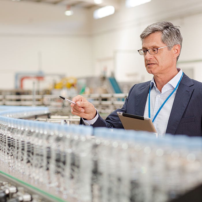 An male employee taking inventory.